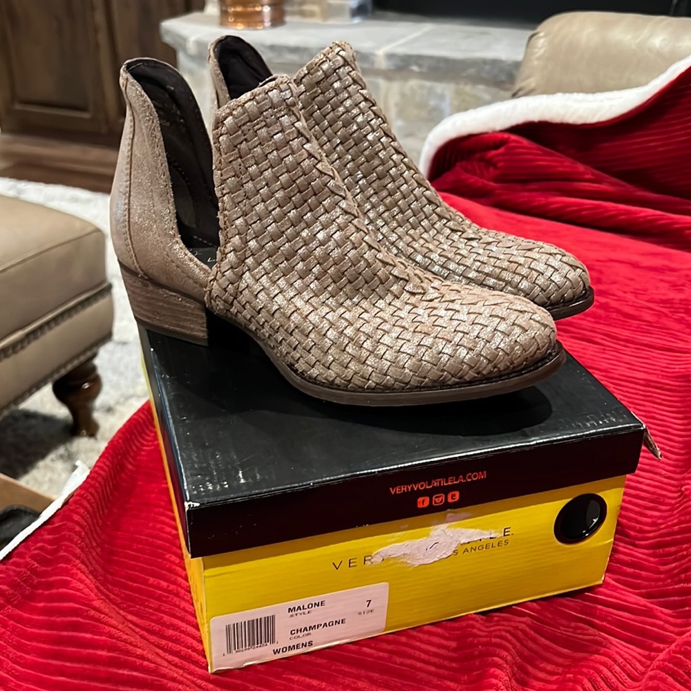 Very Volatile Champagne colored Malone booties with cut out side.